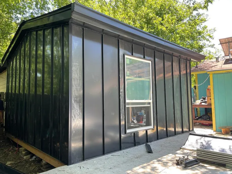 Black standing seam metal wall panels for Roof Inspection in Tyngsborough