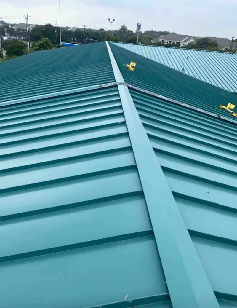 Green commercial metal roof ridge and valley for Metal Roof Repair in Tyngsborough